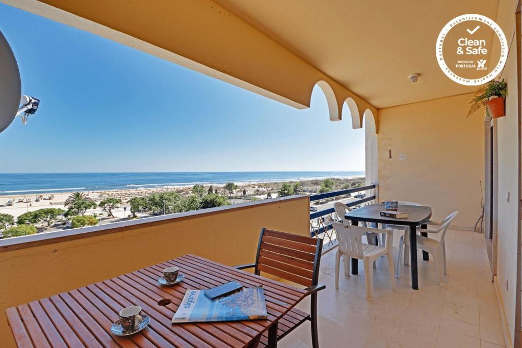 Monte Gordo Beach View by Homing room 1